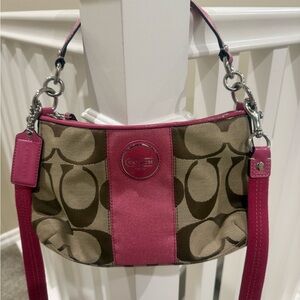 Small tan print Coach bag with pink stripe. Very cute!